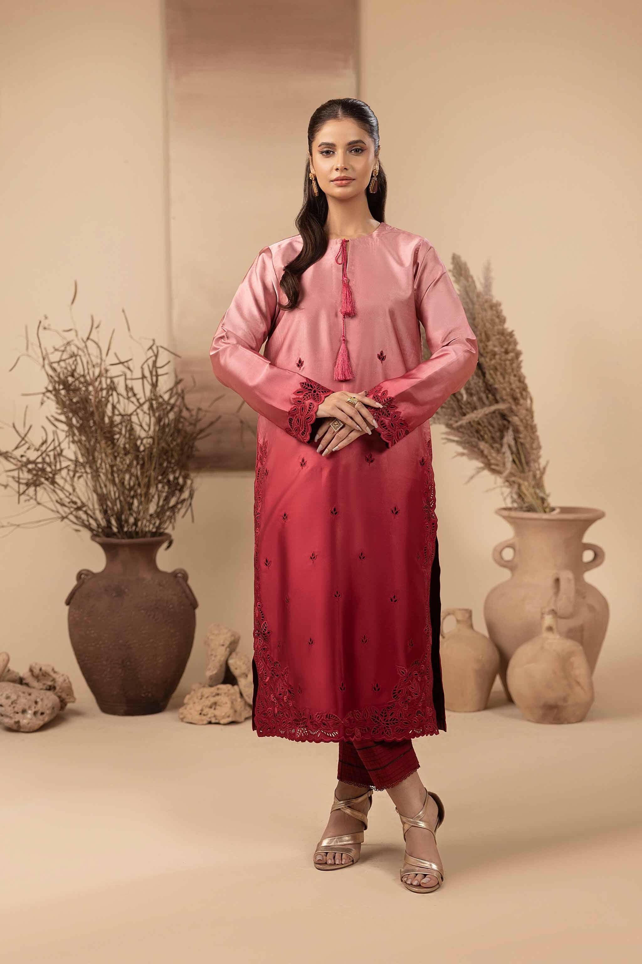 Red silk long shirt, with beautiful ombre effect from baby pink to red. Intricate cutwork machine embroidery adorns the daman and sleeves.