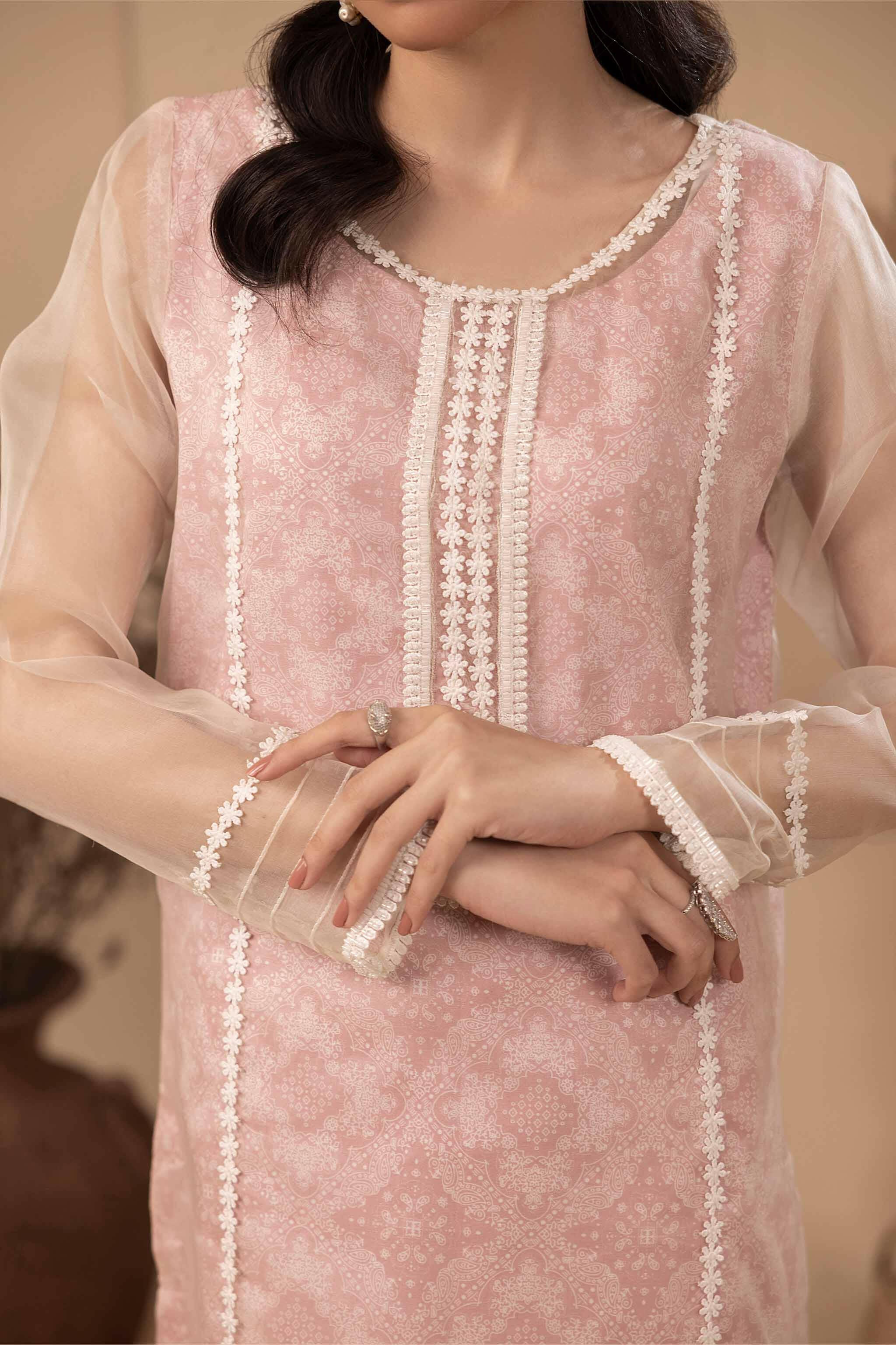 Pink printed silk shirt with layered organza. A-line with 3D embellishments, embellished panel lines and neckline.