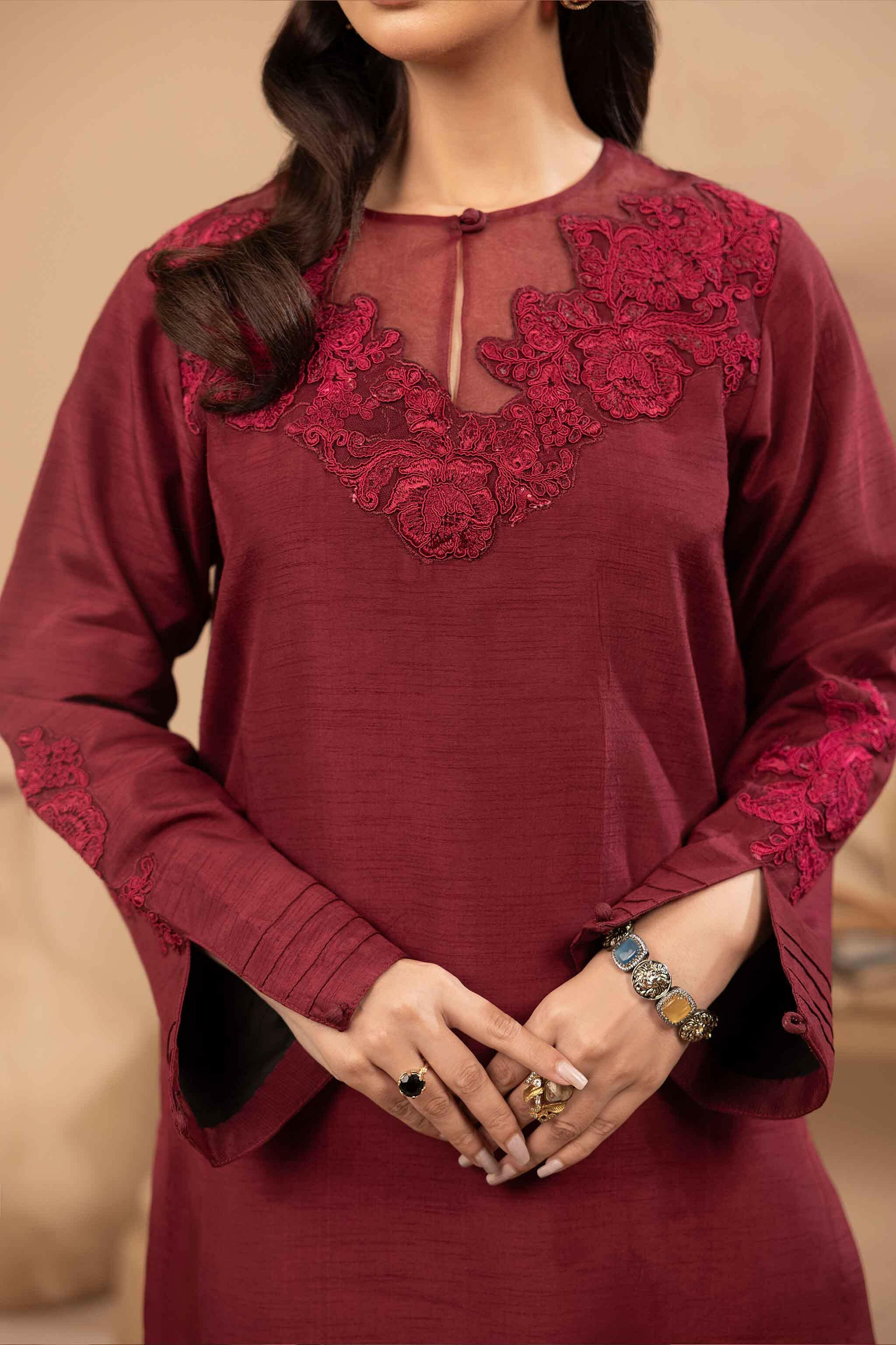 Red silk shirt with embroidery, organza and dori work on the neckline and sleeves.